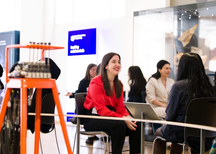 QEPrize Ambassador Carmen with a student