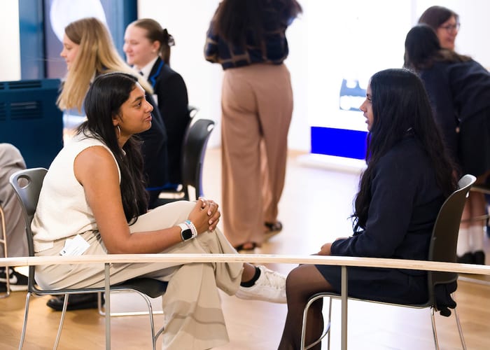 QEPrize Ambassador Krystina with a student