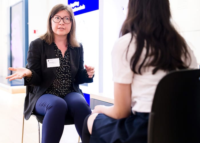 QEPrize Ambassador Polina with a student