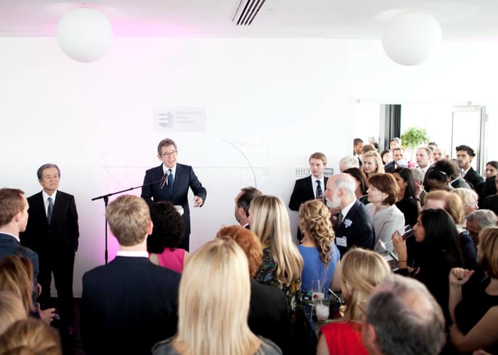 Lord Browne welcomes guests to the 2013 QE Prize celebration at the Tate Modern