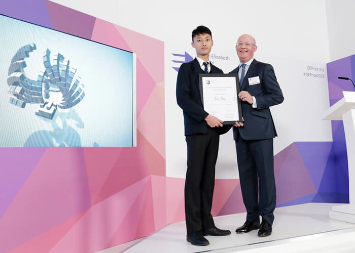 Jack Jiang is presented with the Create the Trophy certificate by Sir Ian Blatchford at the 2019 QEPrize Winner Announcement